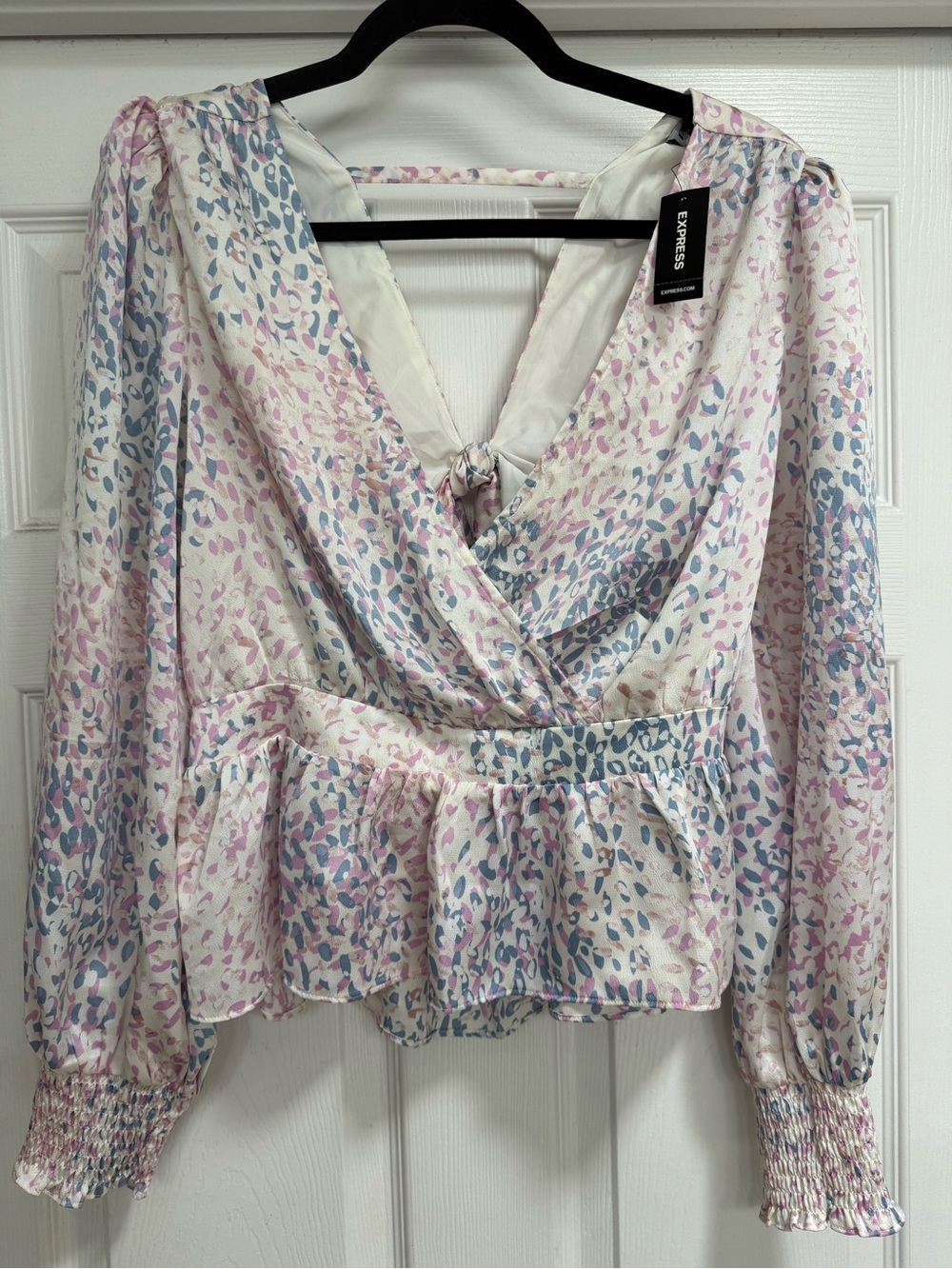 Express Pastel Leopard Print Peplum Blouse in Pink and Blue